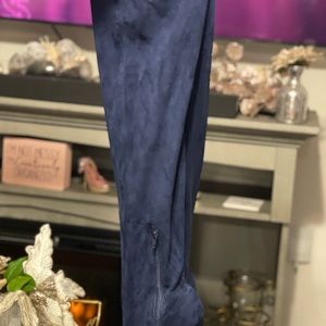 Navy blue thigh high boots.